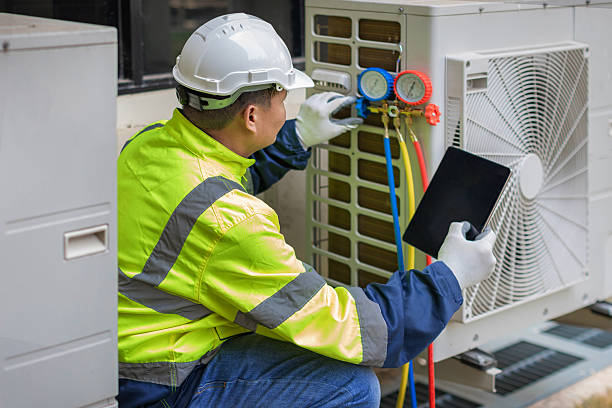 Professional Air Conditioning Repair technician working in Mayflower, AR